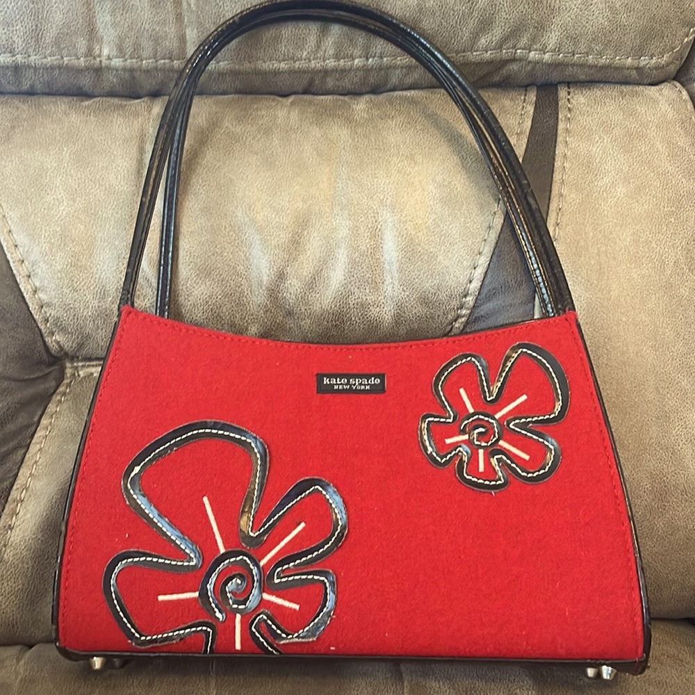 Kate Spade red handbag.